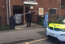 Two men arrested after women's bodies found in east London freezer
