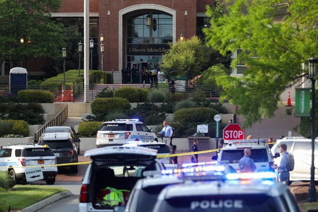 Police keep the campus on lockdown after a shooting at the University of North Carolina in Charlotte.