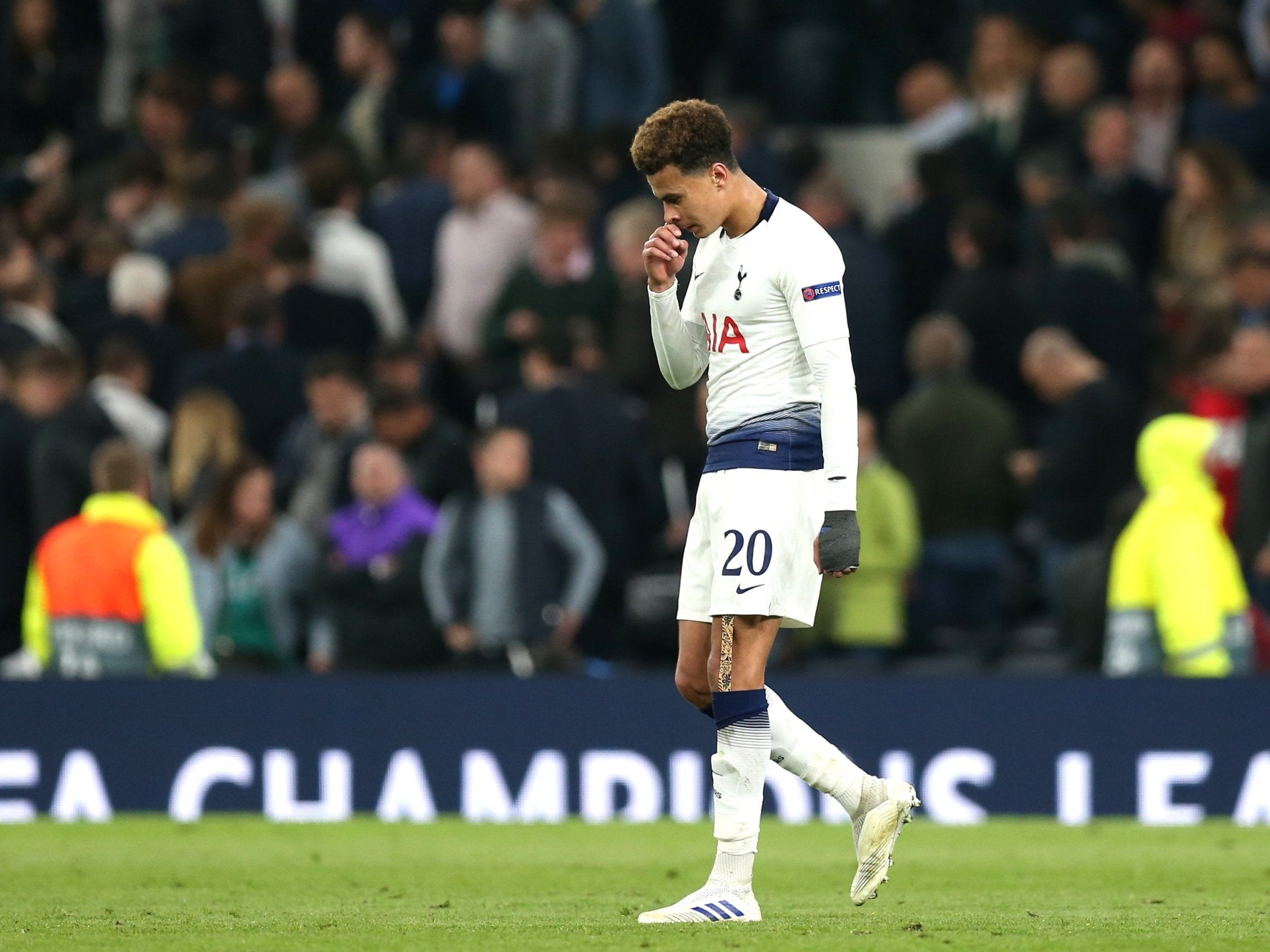 Dele Alli of Tottenham Hotspur looks dejected