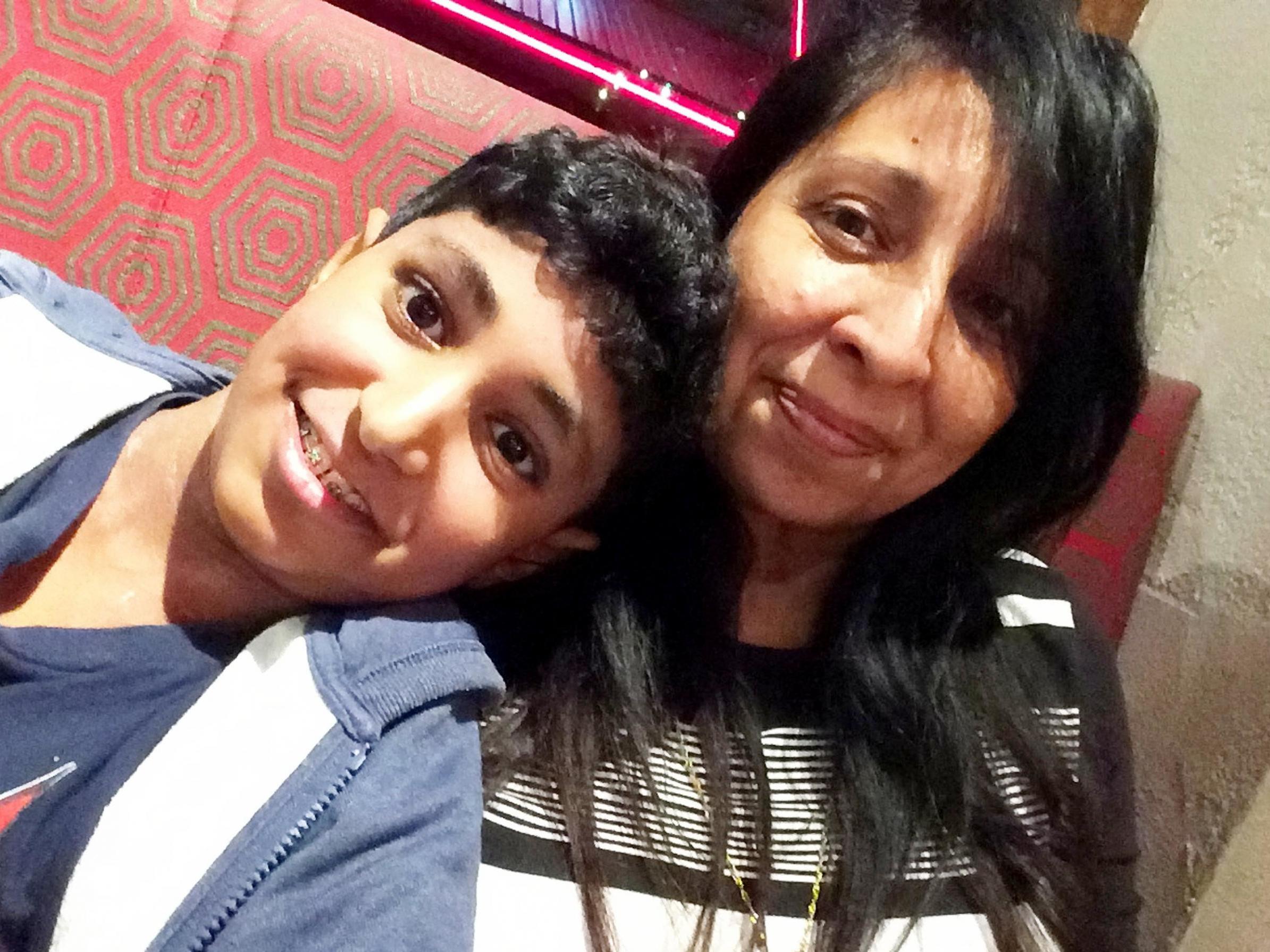 Karanbir Cheema with his mother Rina, who said in a statement that the school had a full report on his allergies
