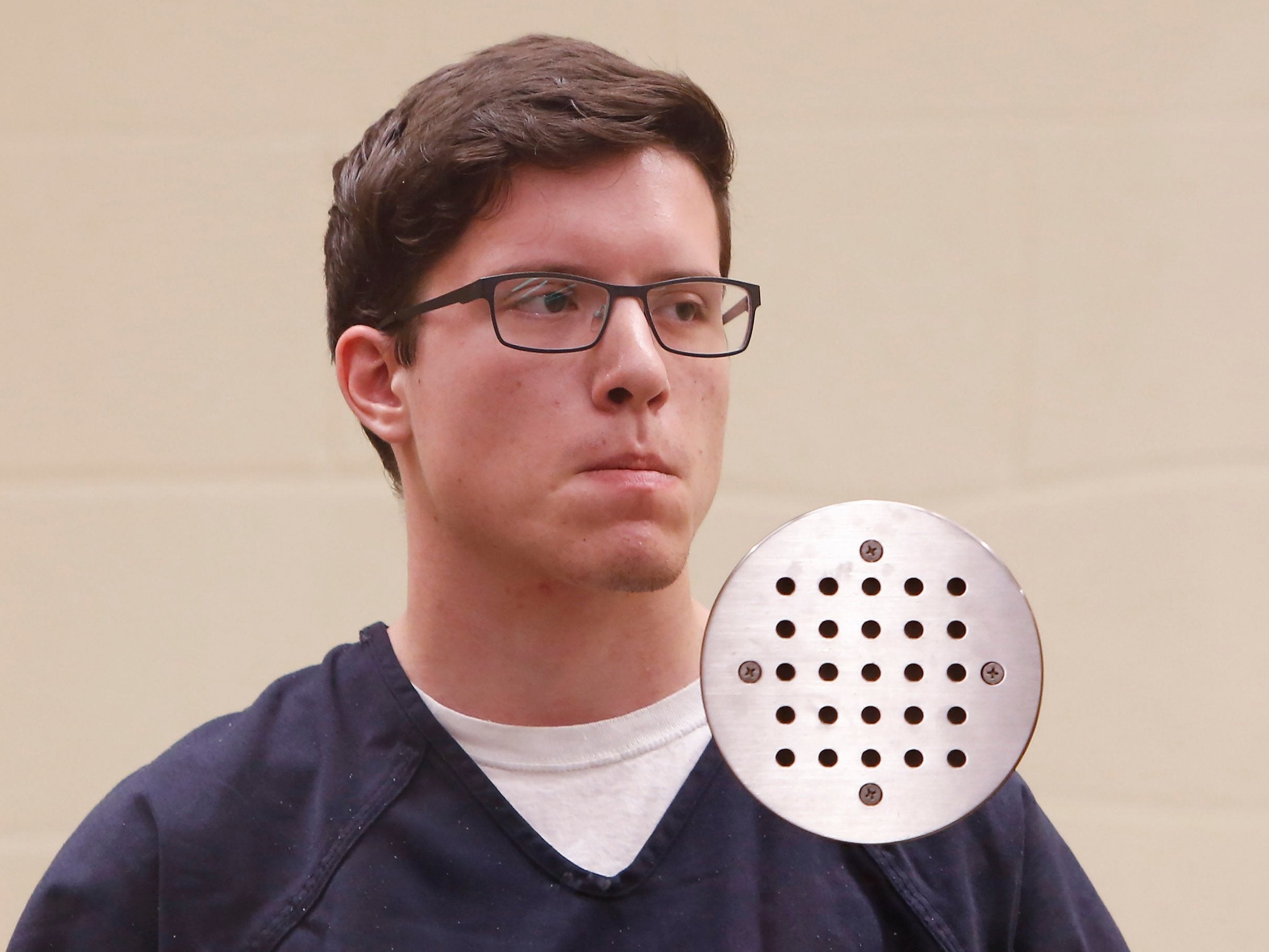 John T. Earnest stands at his arraignment hearing in San Diego County Superior Court