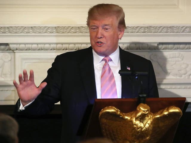President Donald Trump speaks during a National Day of Prayer event in the State Dining Room at the White House on Thursday on 1 May 2019 in Washington