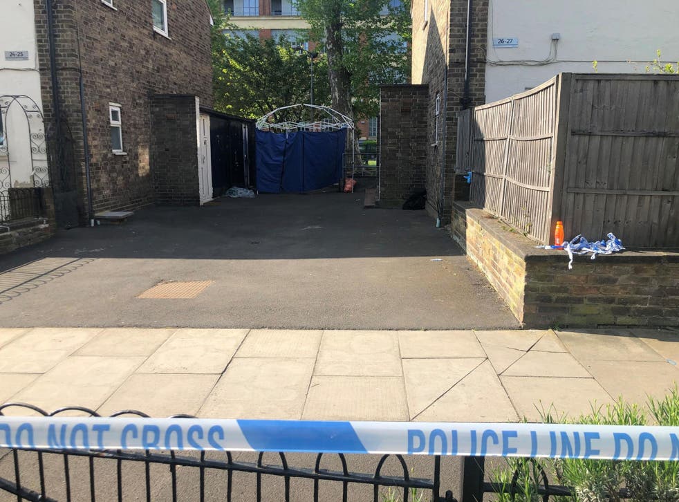 The scene at Somerford Grove in Hackney, east London, where a boy believed to be 15 years old has been stabbed to death