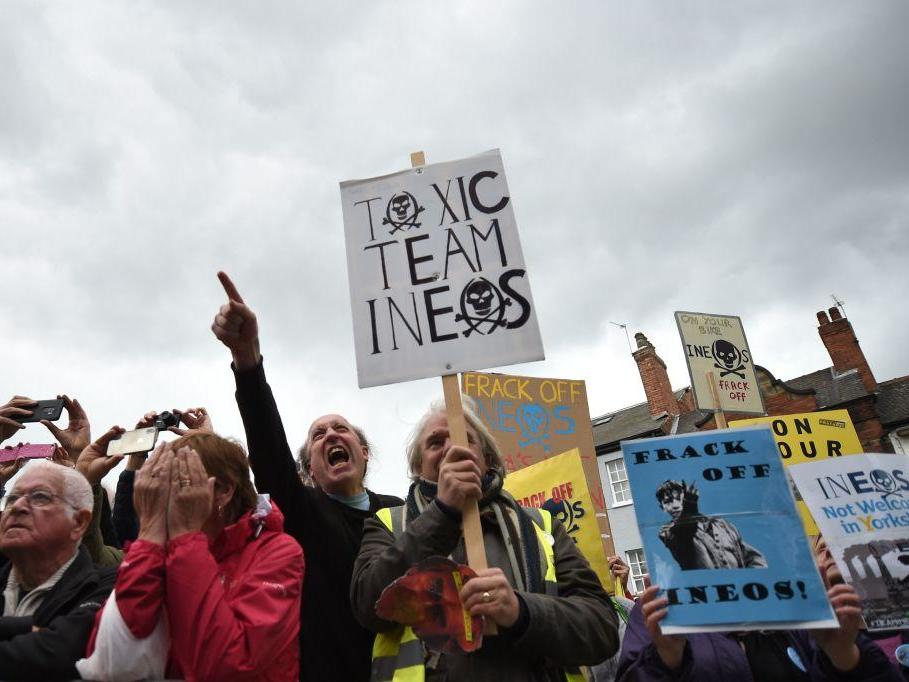 Campaigners protest against Team Ineos at the Tour de Yorkshire