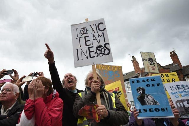 Campaigners protest against Team Ineos at the Tour de Yorkshire