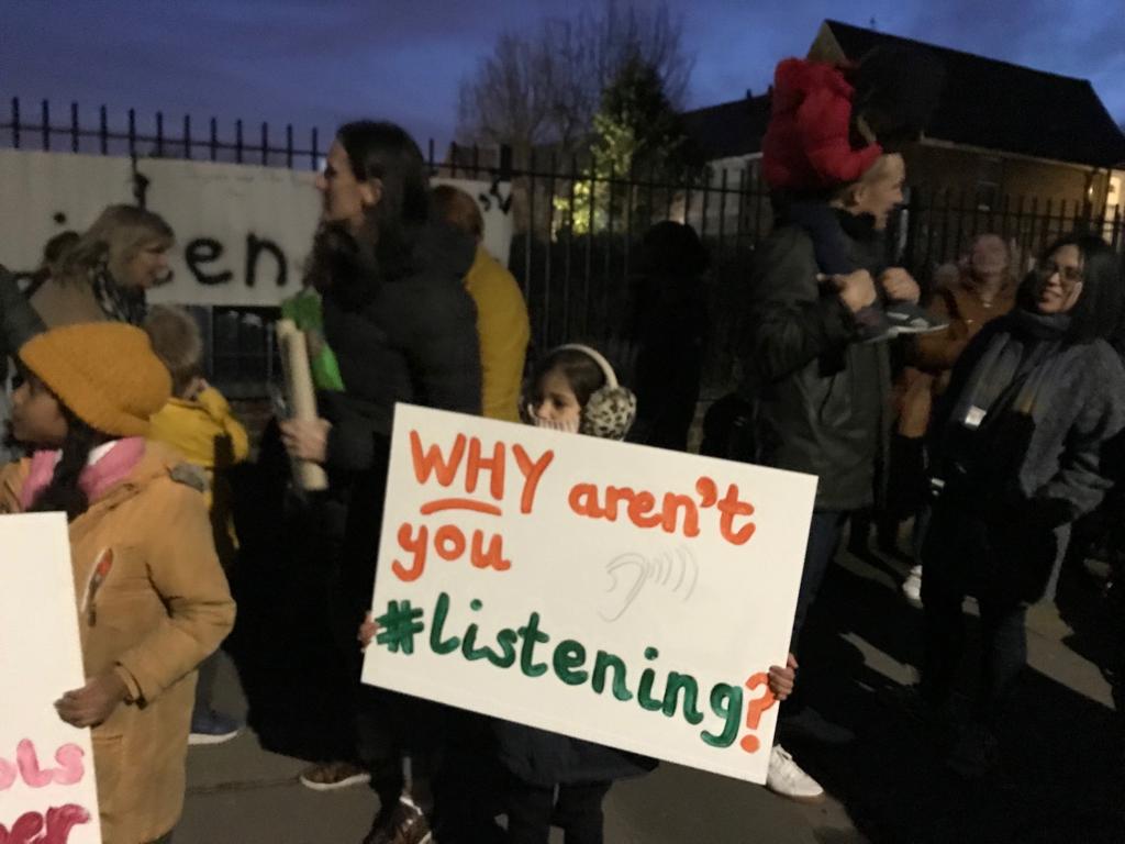 Parents and children protested outside Our Lady of Lourdes Primary School against academisation (OLOL E11 Parents )