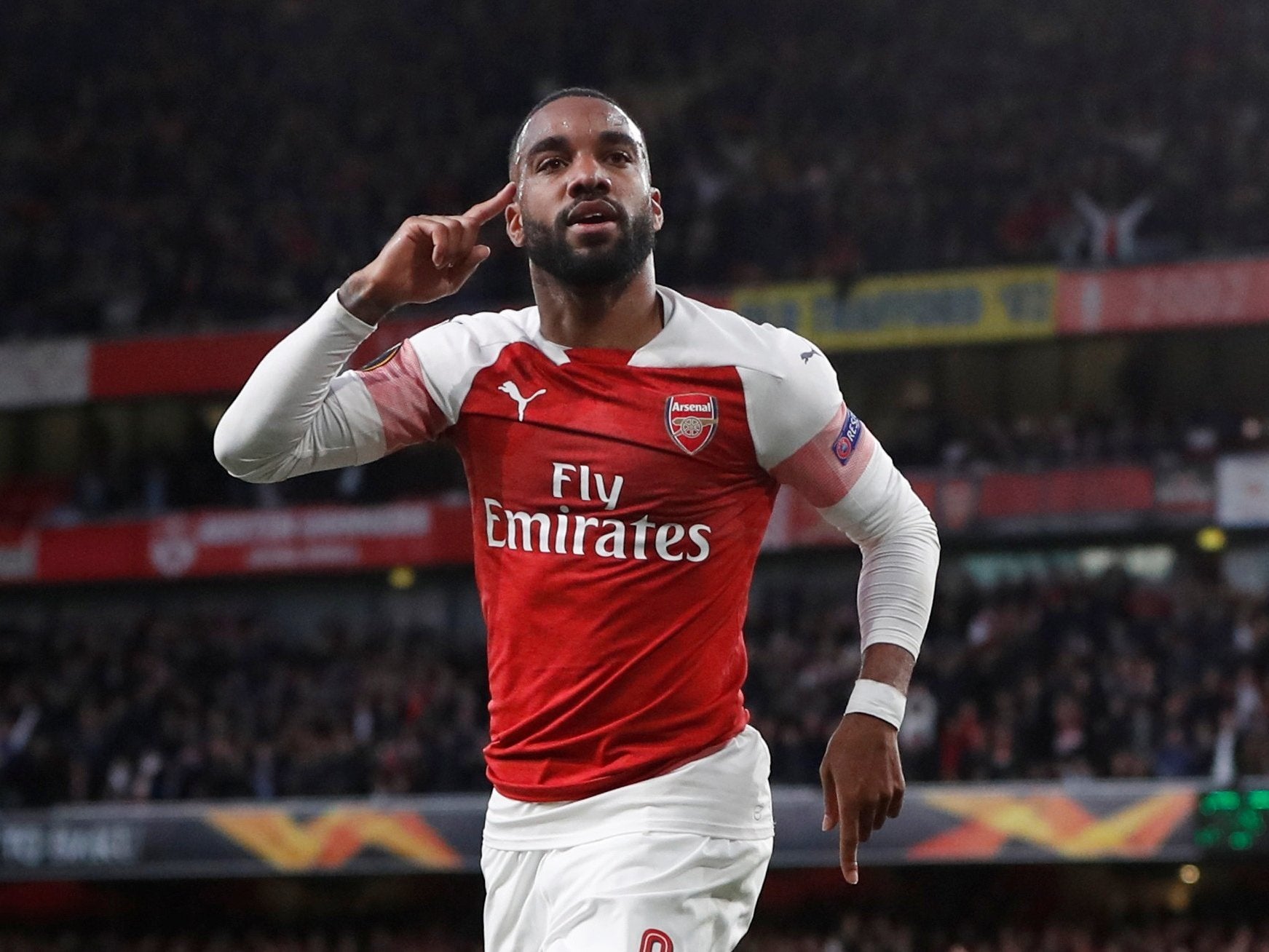 The Frenchman celebrates scoring Arsenal's opener