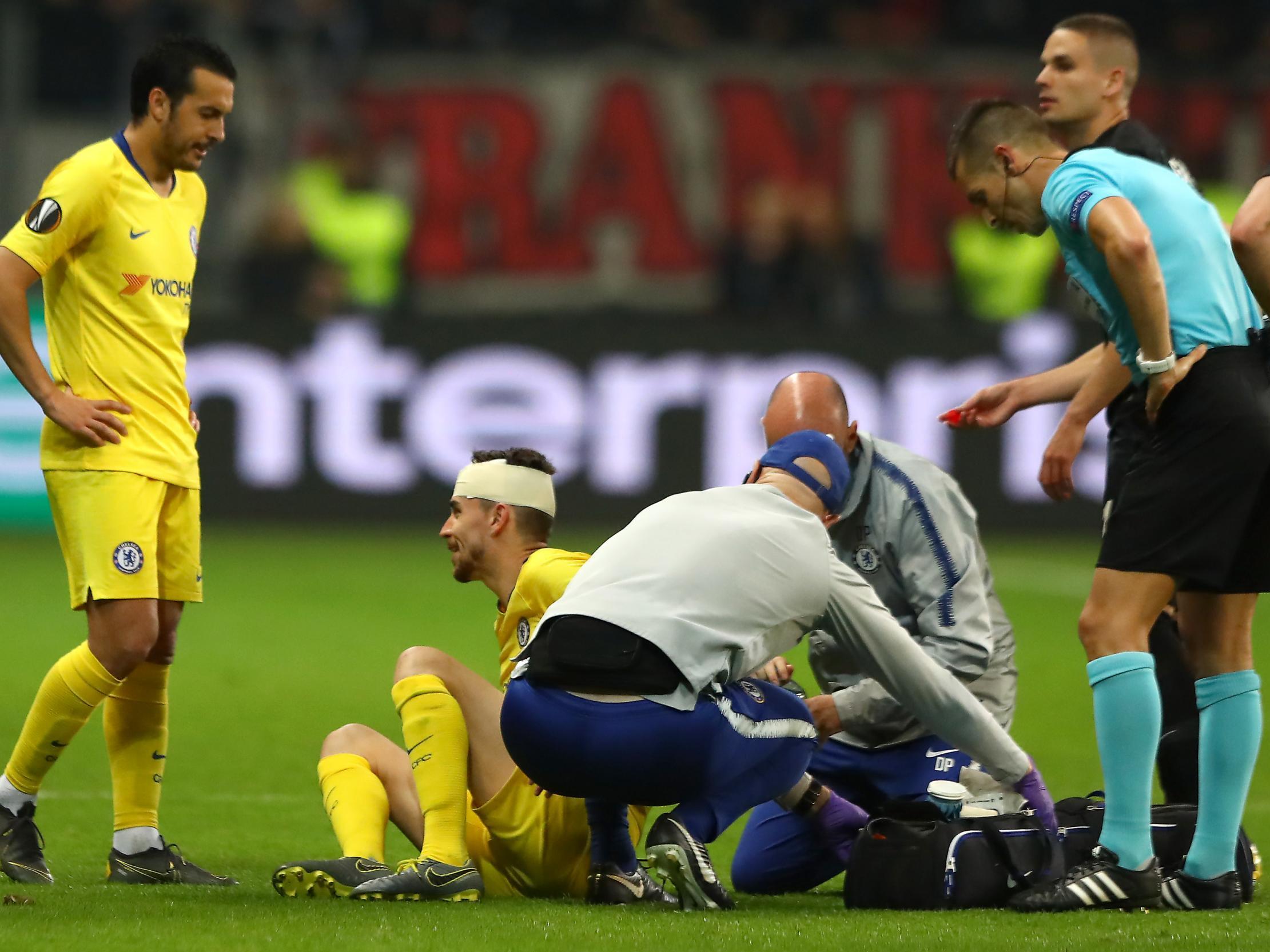 Jorginho receives treatment from Chelsea's medical staff