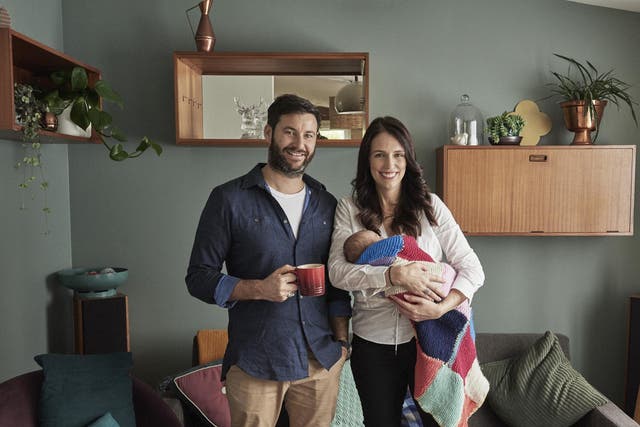New Zealand prime minister and partner Clarke Gayford pose with their baby daughter Neve Gayford at their home on 2 August 2018 in Auckland.
