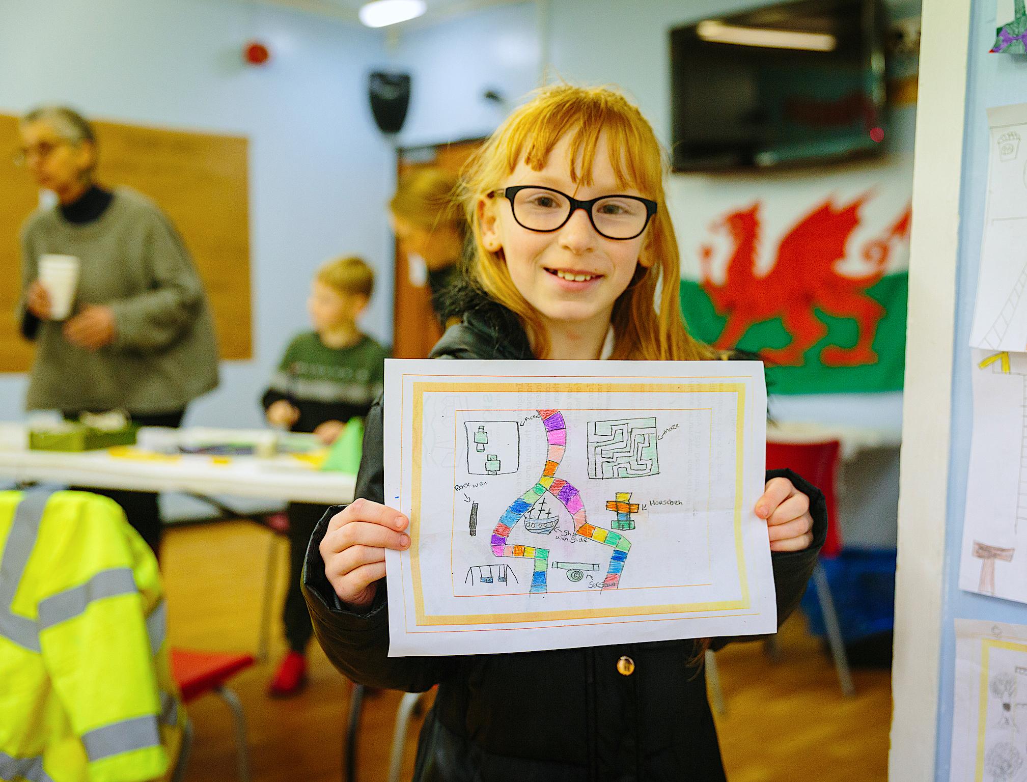 A girl in Caerau presents her vision of the area for Skyline, a project getting people to reimagine their relationship to the land