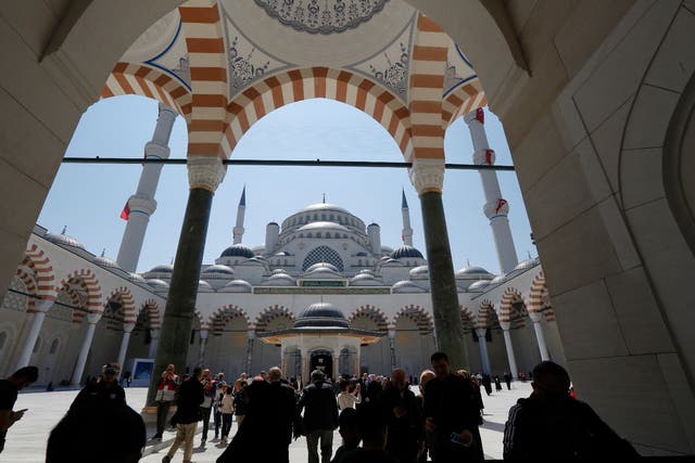 People visit the Camlica mosque the day of its inauguration