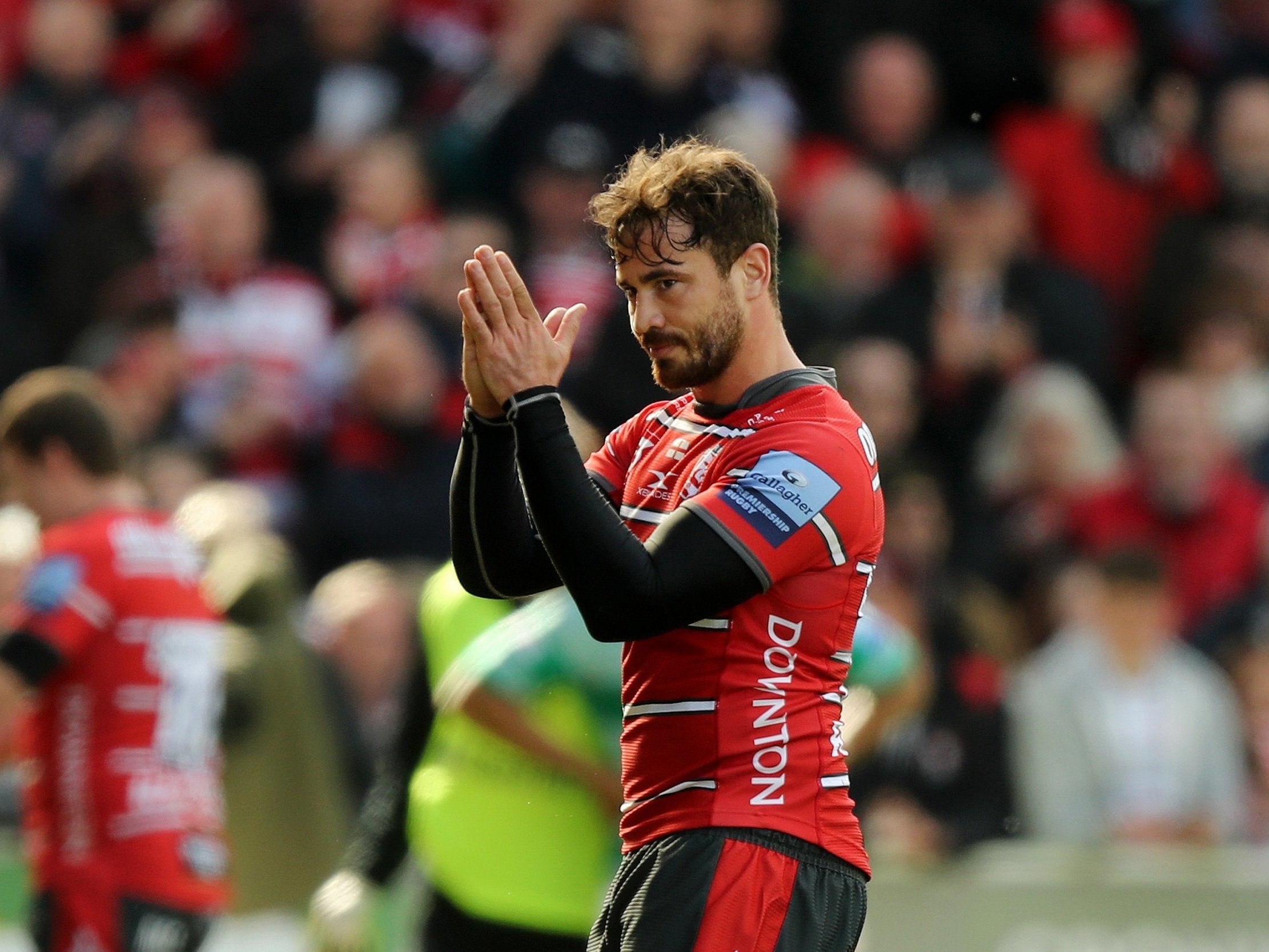 Danny Cipriani applauds the Gloucester fans as he leaves the field