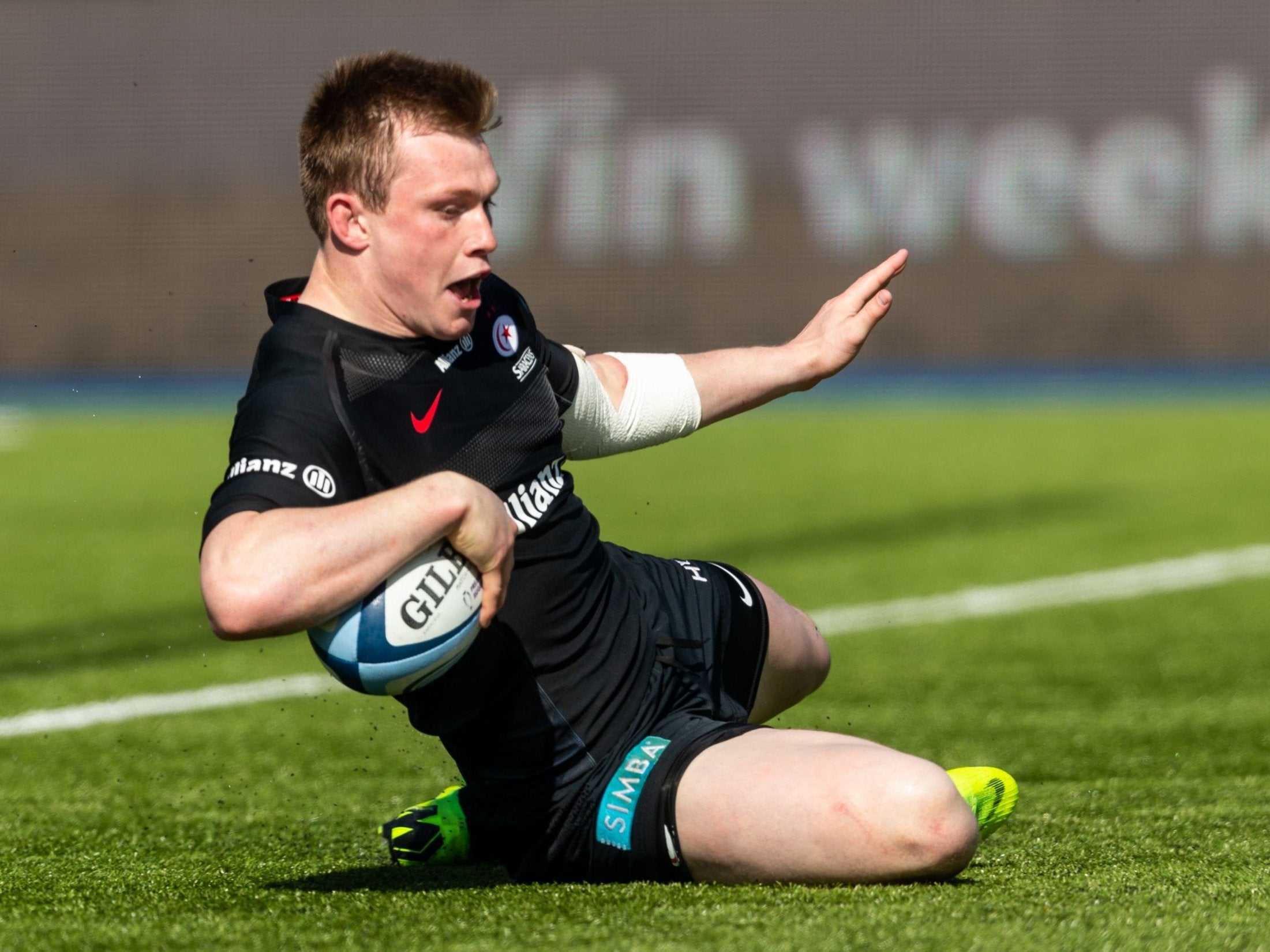 Nick Tompkins scores one of Saracens' five tries in the victory over Exeter Chiefs