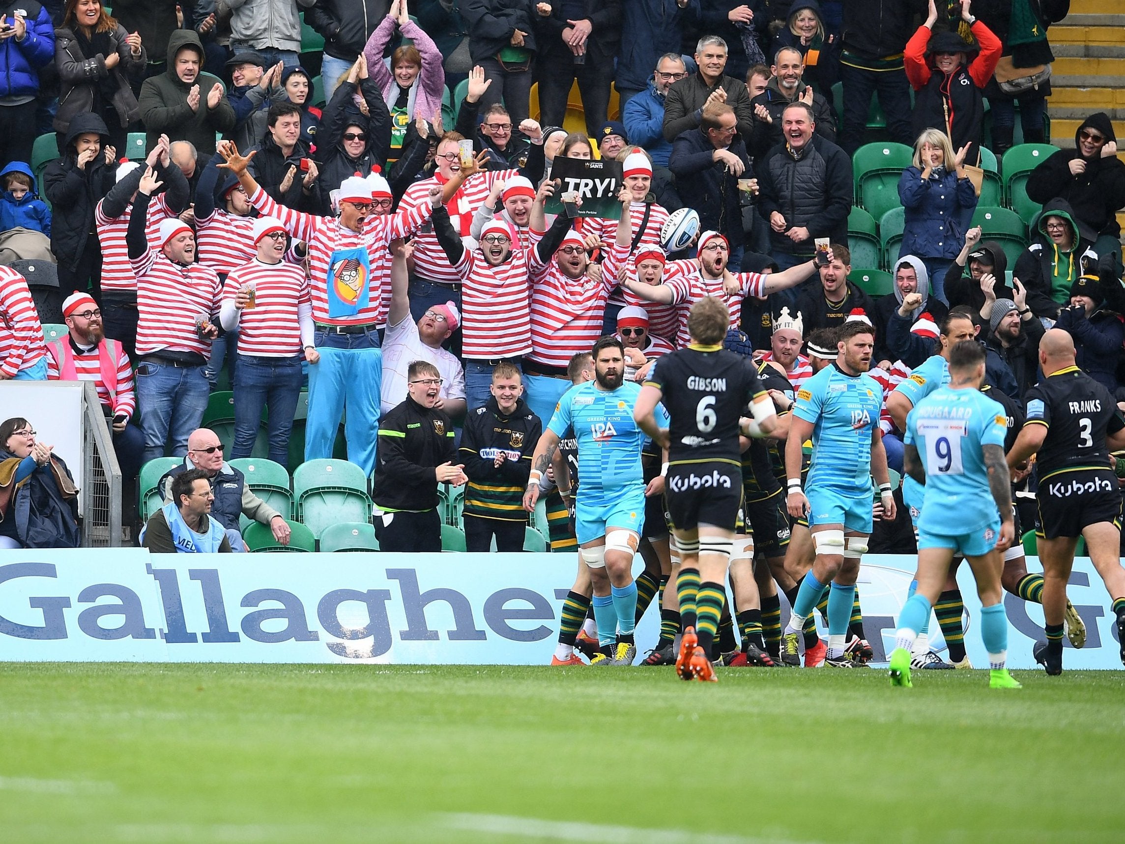 Northampton Saints players celebrate after Luther Burrell scores a try against Worcester