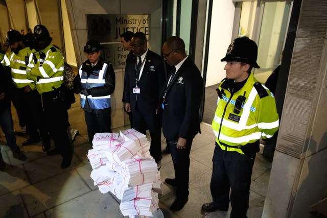 Protesters dumped documents representing rape victims’ phone data outside the CPS’s offices in November