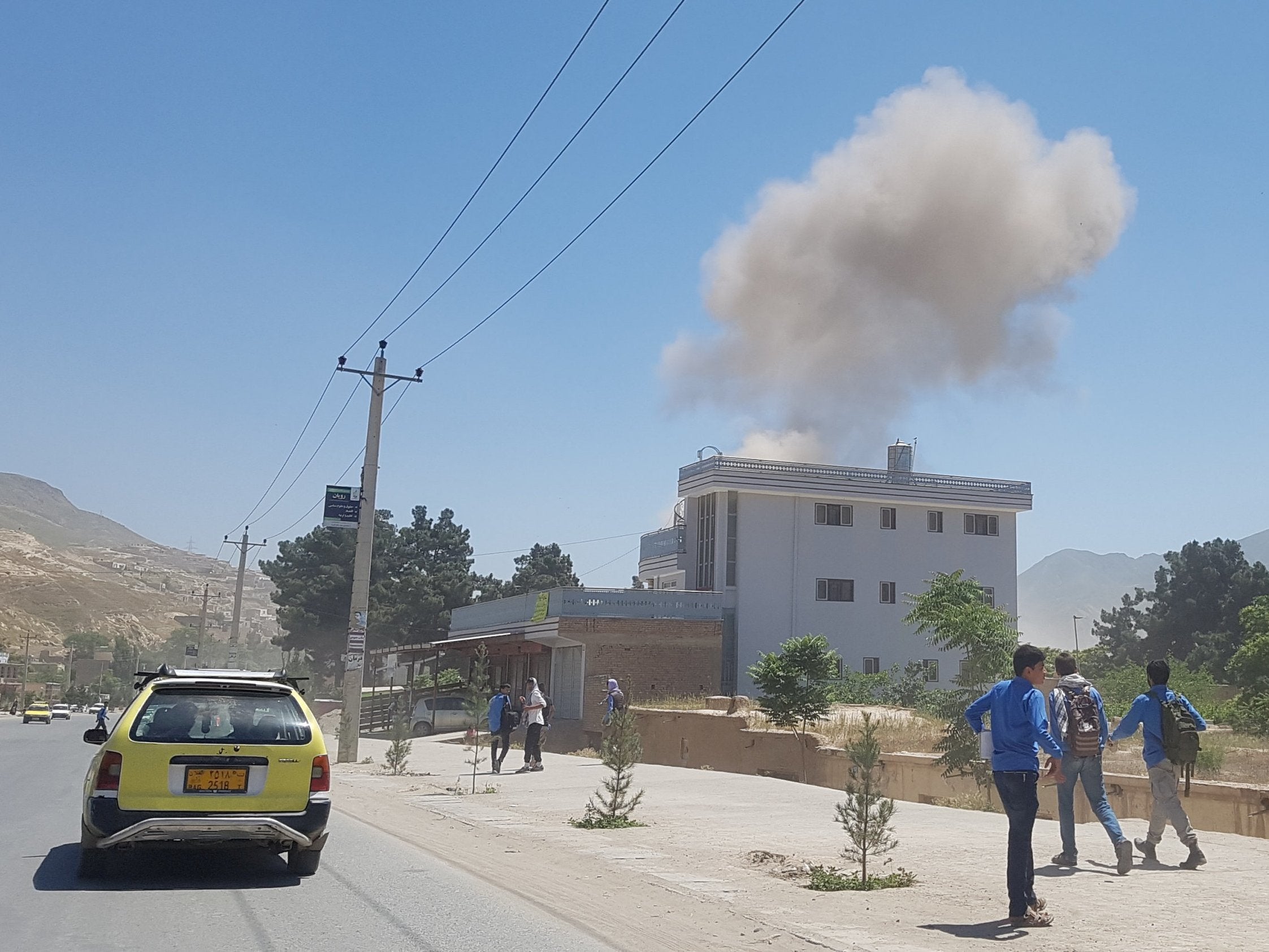 A government official said the bomber blew up a Humvee loaded with explosives outside the police headquarters in Pul-e-Khumri