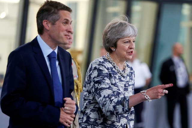 Theresa May and Gavin Williamson photographed in 2018