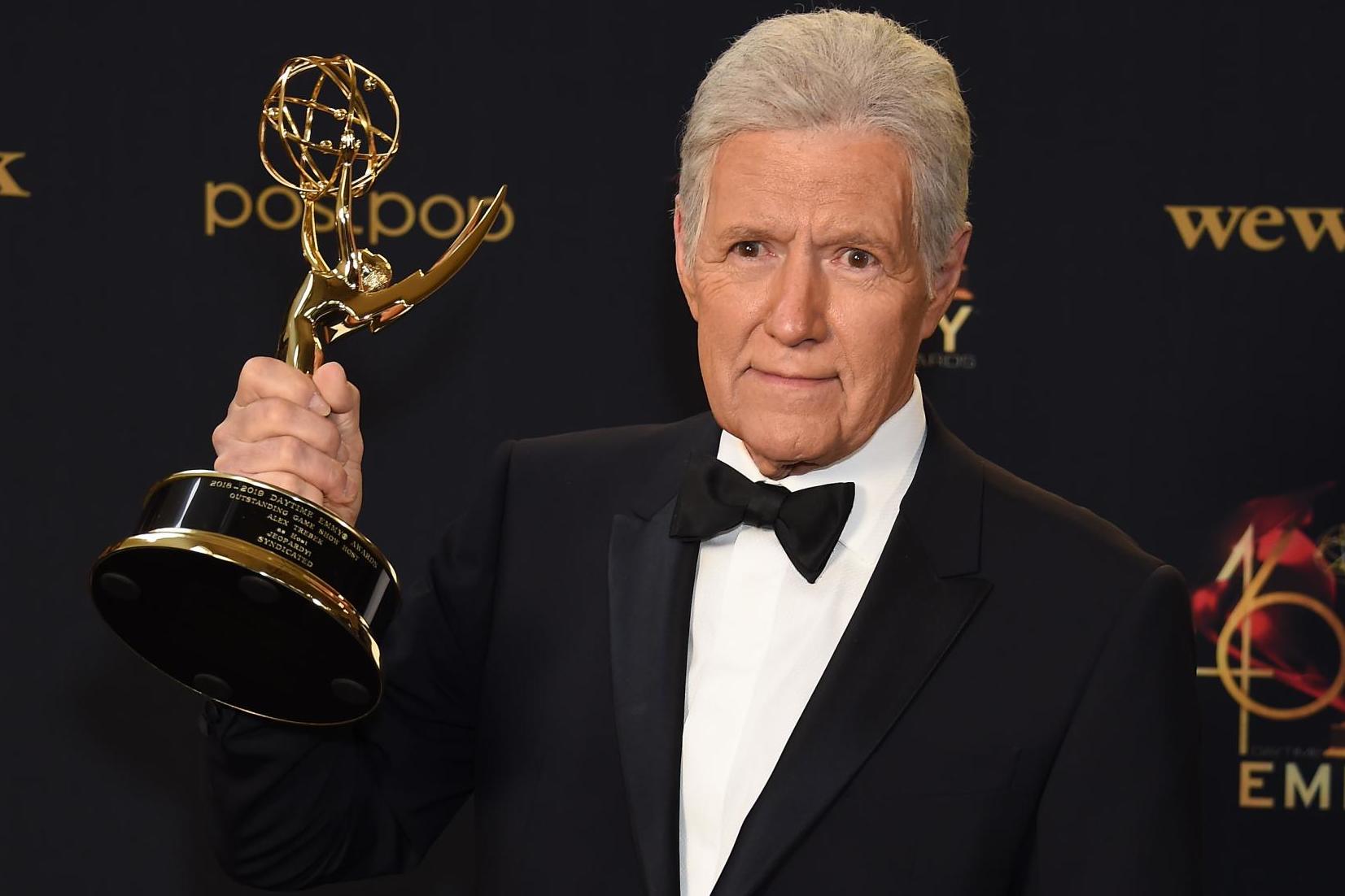 Alex Trebek poses with his Daytime Emmy for Outstanding Game Show Host on 5 May, 2019 in Pasadena, California.