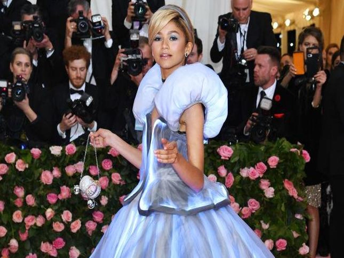 Zendaya Dons Plunging White Dress for Louis Vuitton's Show in