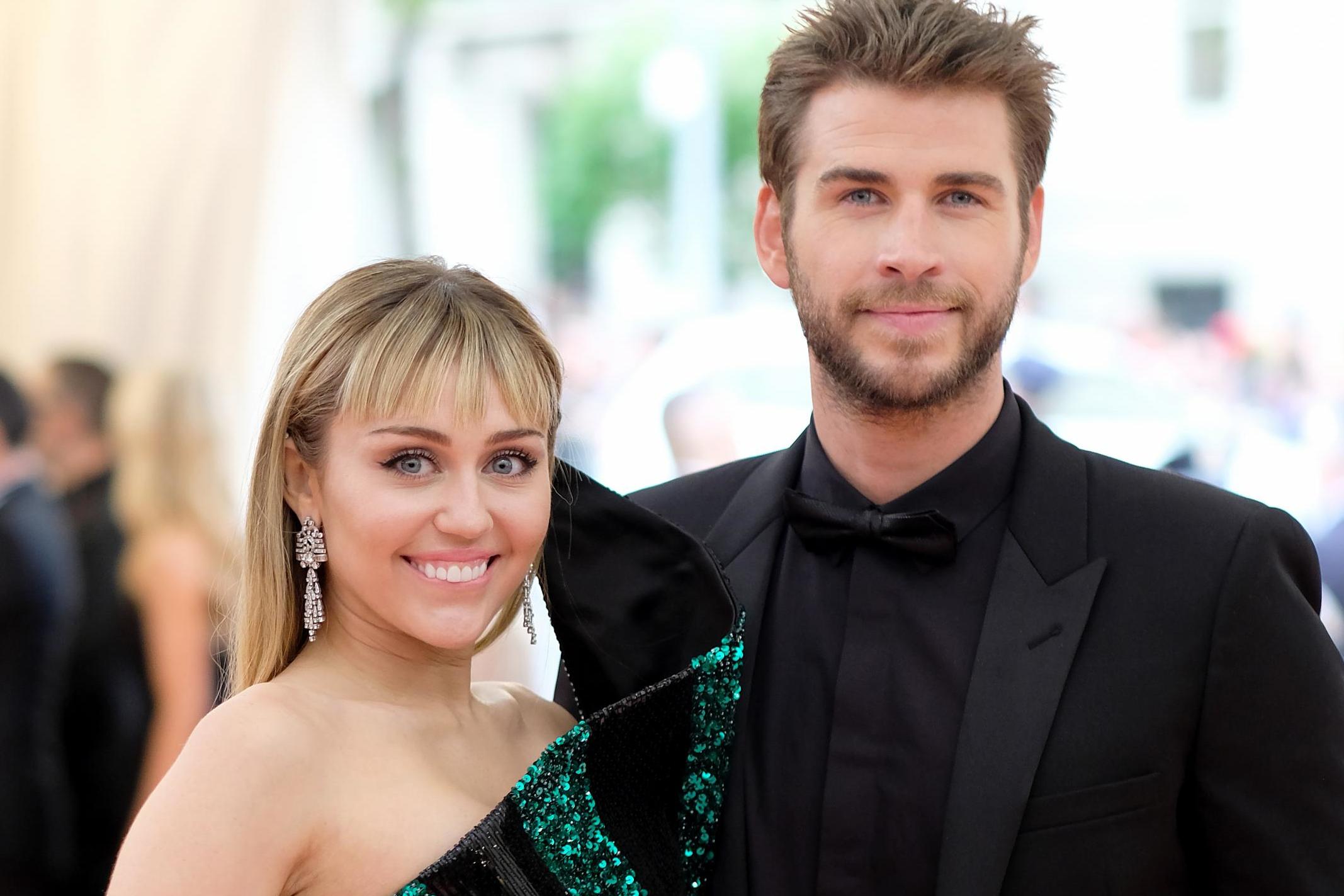 Miley Cyrus and Liam Hemsworth attend the Met Gala 2019