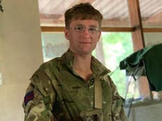 British soldier tried to climb tree to flee fatal elephant charge, inquest told