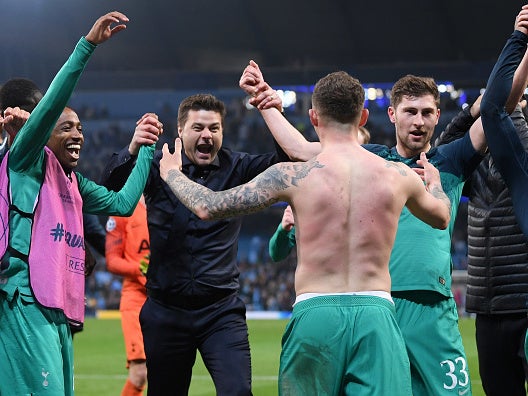 Pochettino celebrates with his players