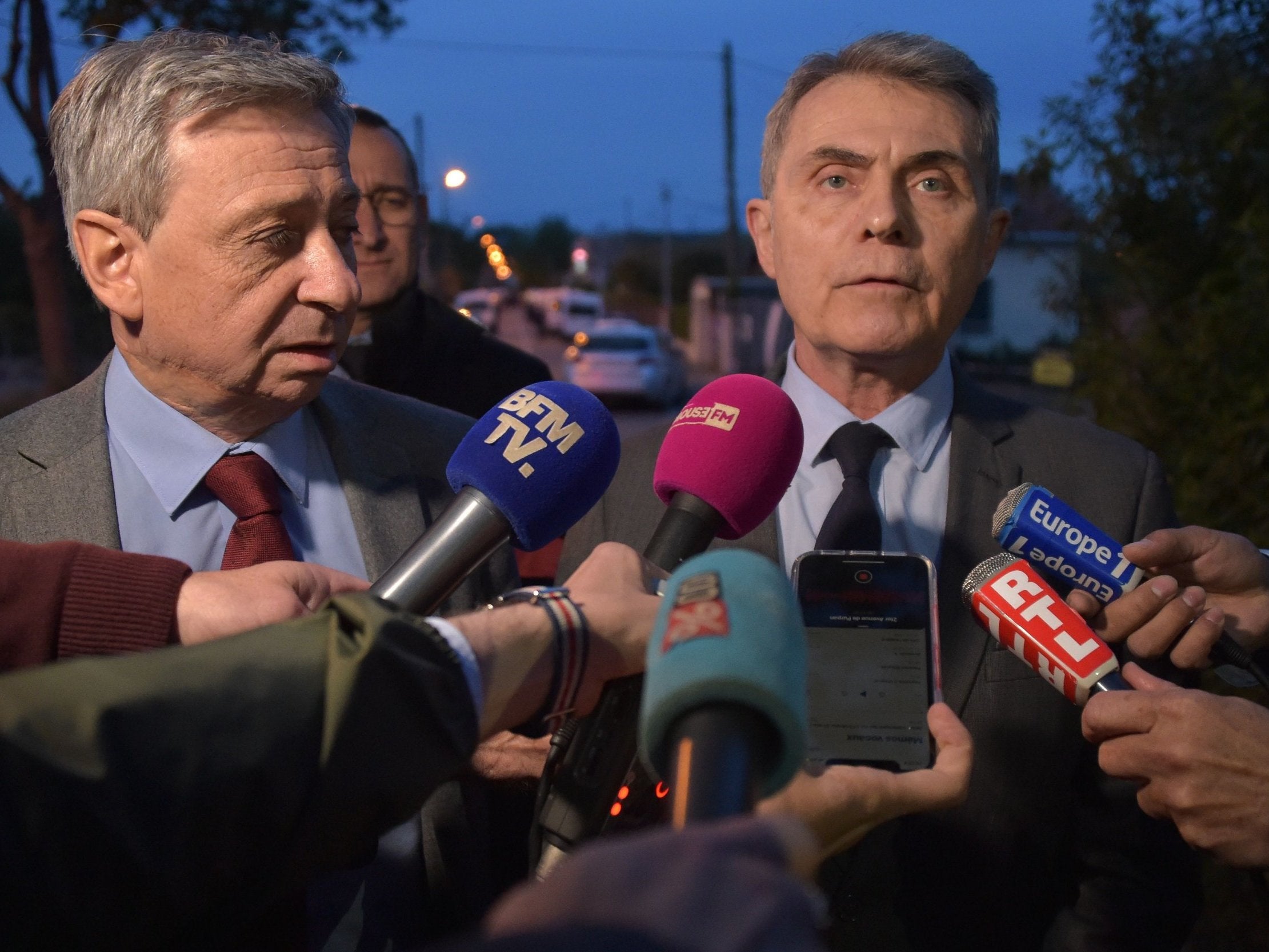Regional police chief Etienne Guyot (l), and Toulouse's public prosecutor Dominique Alzeari talk to the press in Blagnac during standoff