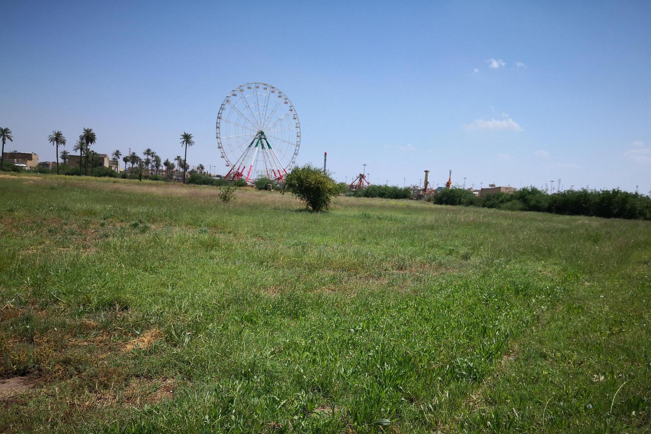 Amara cemetery today with the ‘Missan Children’s Funfair’ in the background