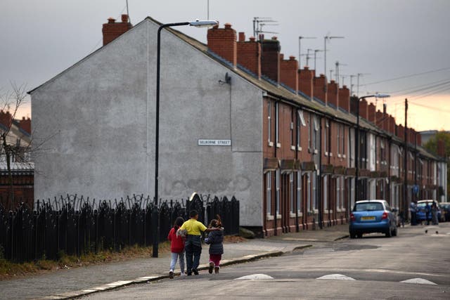 Children walk along a street in Rotherham, where the National Crime Agency has been investigating grooming gangs