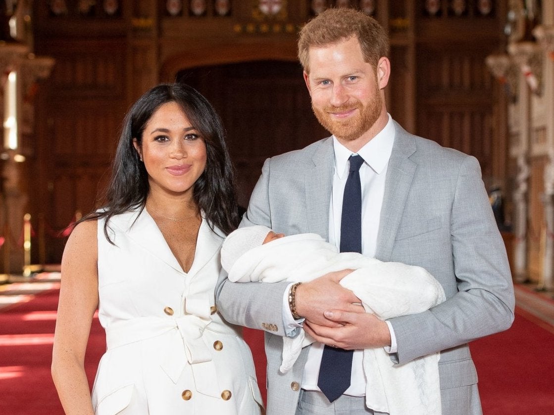 The Duke and Duchess of Sussex with their baby son, who was born on Monday morning, during a photocall in St George's Hall at Windsor Castle in Berkshire. (PA_Images)