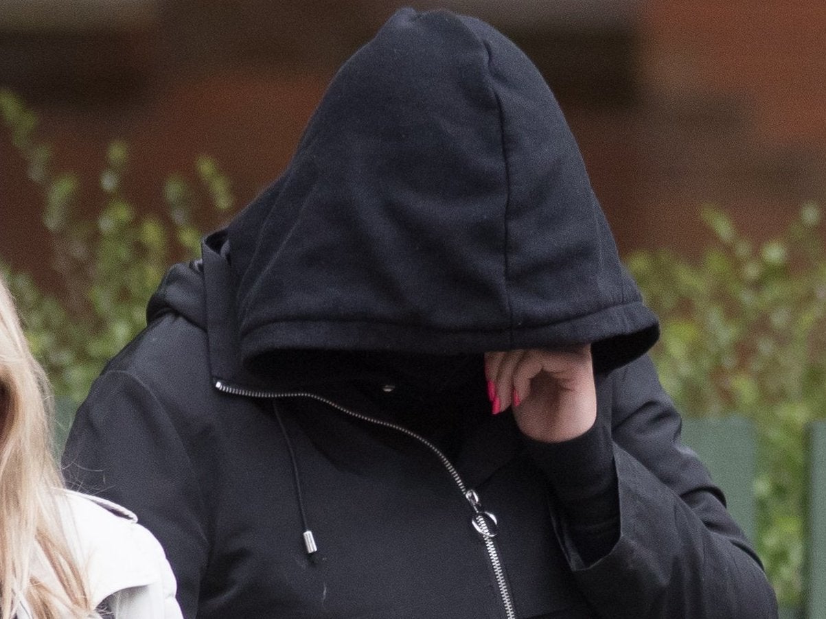 Hannah Cobley, 29, leaves Leicester Crown Court where she denies murdering her unnamed infant in April 2017 while she was living at a farm in Leicestershire.