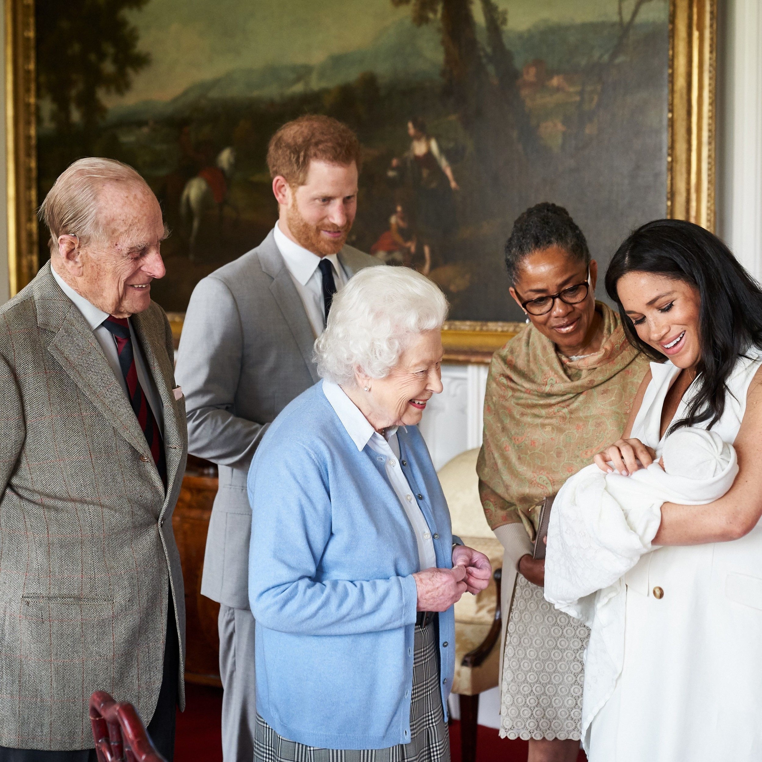 The Duke and Duchess of Sussex are joined by her mother, Doria Ragland, as they show their new son, Archie Harrison Mountbatten-Windsor, to the Queen Elizabeth II and the Duke of Edinburgh at Windsor Castle in May, 2019