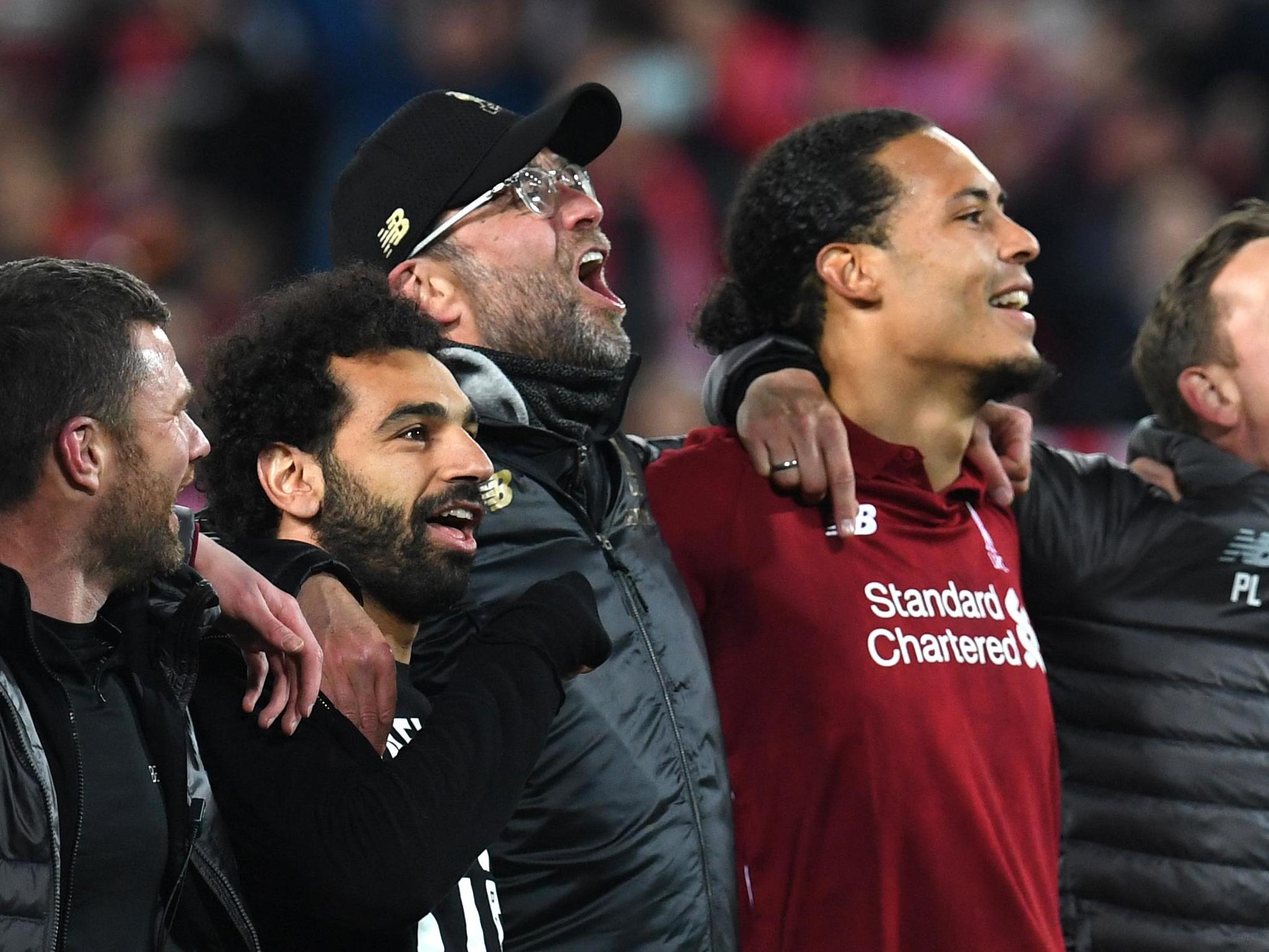 Klopp celebrates with Jurgen Klopp and Mohamed Salah (AFP/Getty)