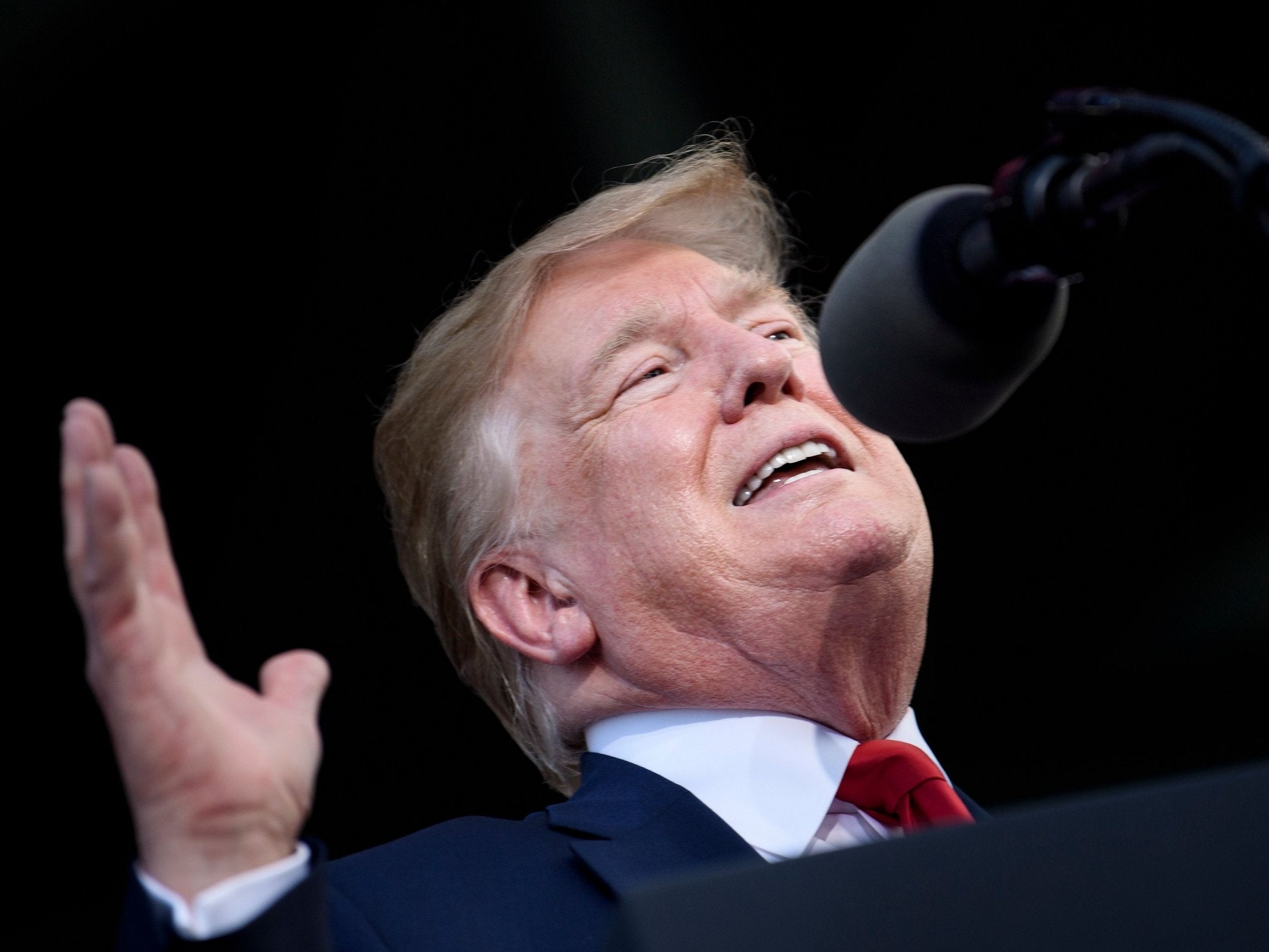 Donald Trump told supporters at a rally in Panama City Beach, Florida, that China would "be paying" if it failed to agree to a deal