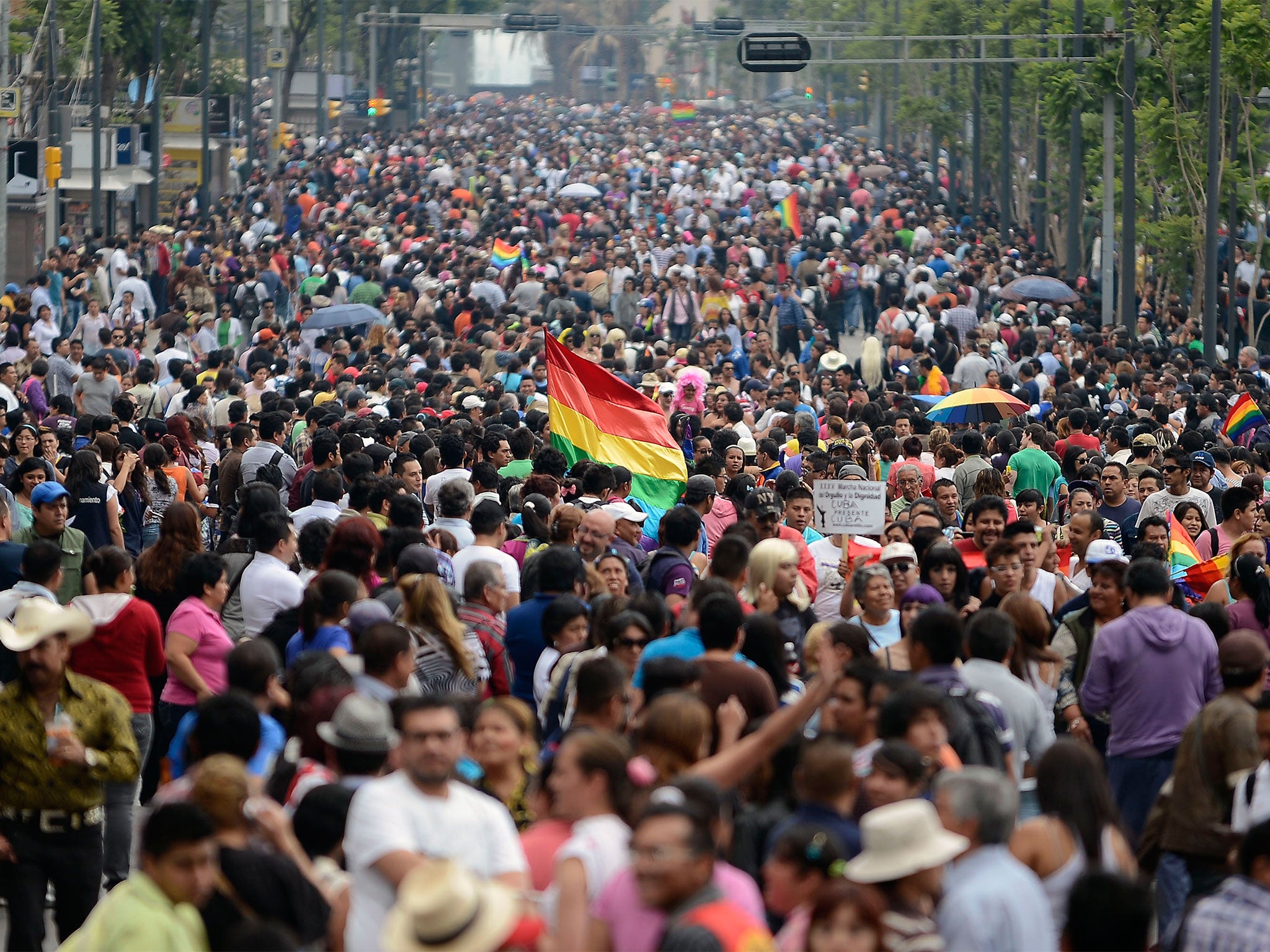 People march during a Gay Pride Parade in Mexico City's Reforma Avenue; the country is slowly moving towards equal rights for LGBT+ peopel