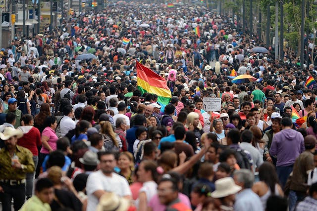 People march during a Gay Pride Parade in Mexico City's Reforma Avenue; the country is slowly moving towards equal rights for LGBT+ peopel