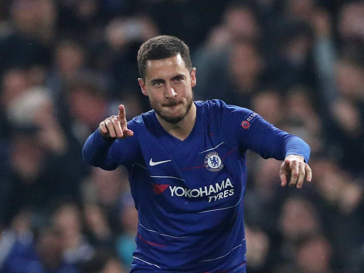 Eden Hazard celebrates scoring the winning penalty