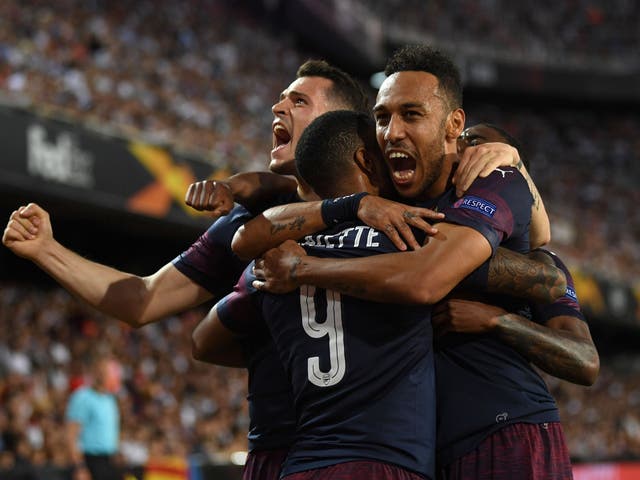 Pierre-Emerick Aubameyang celebrates scoring his third goal as Arsenal beat Valencia