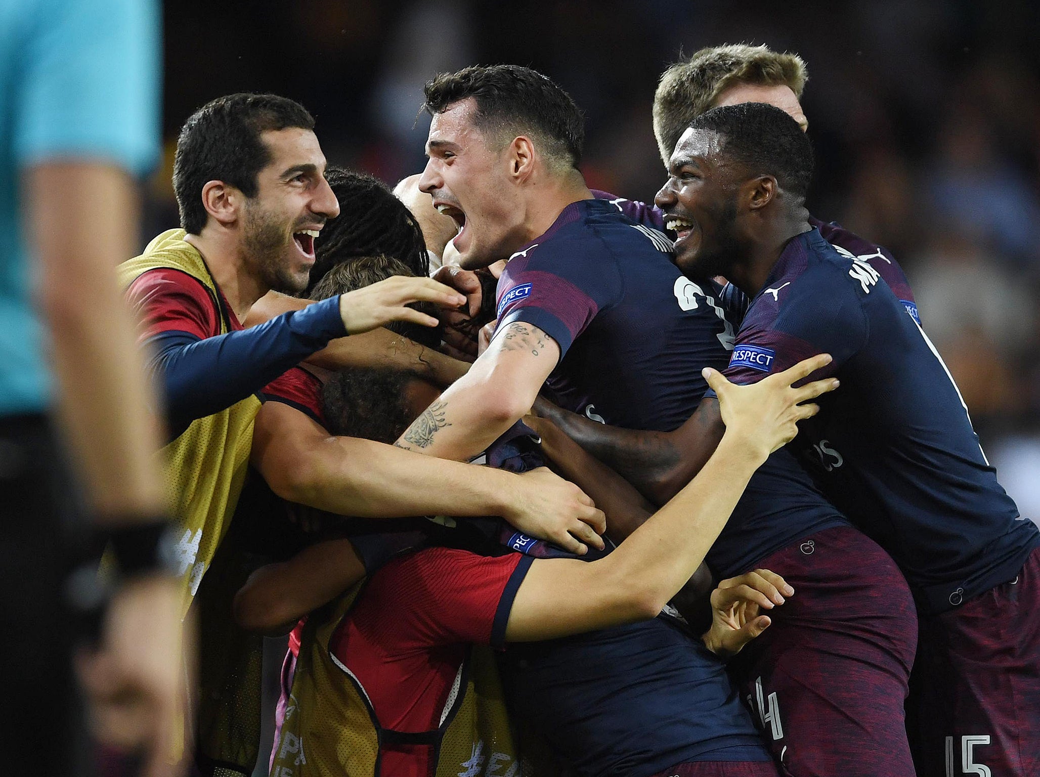 Arsenal celebrate their triumph over Valencia