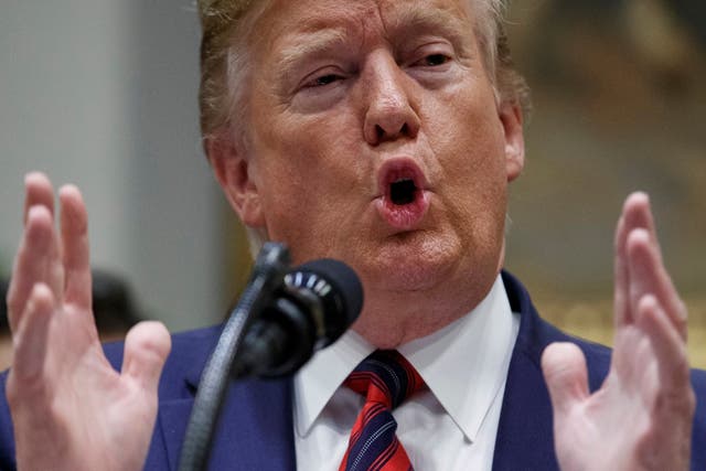 President Donald Trump responds to a question from the news media following his remarks on ending surprise medical billing in the Roosevelt room of the White House in Washington, DC, on 9 May 2019