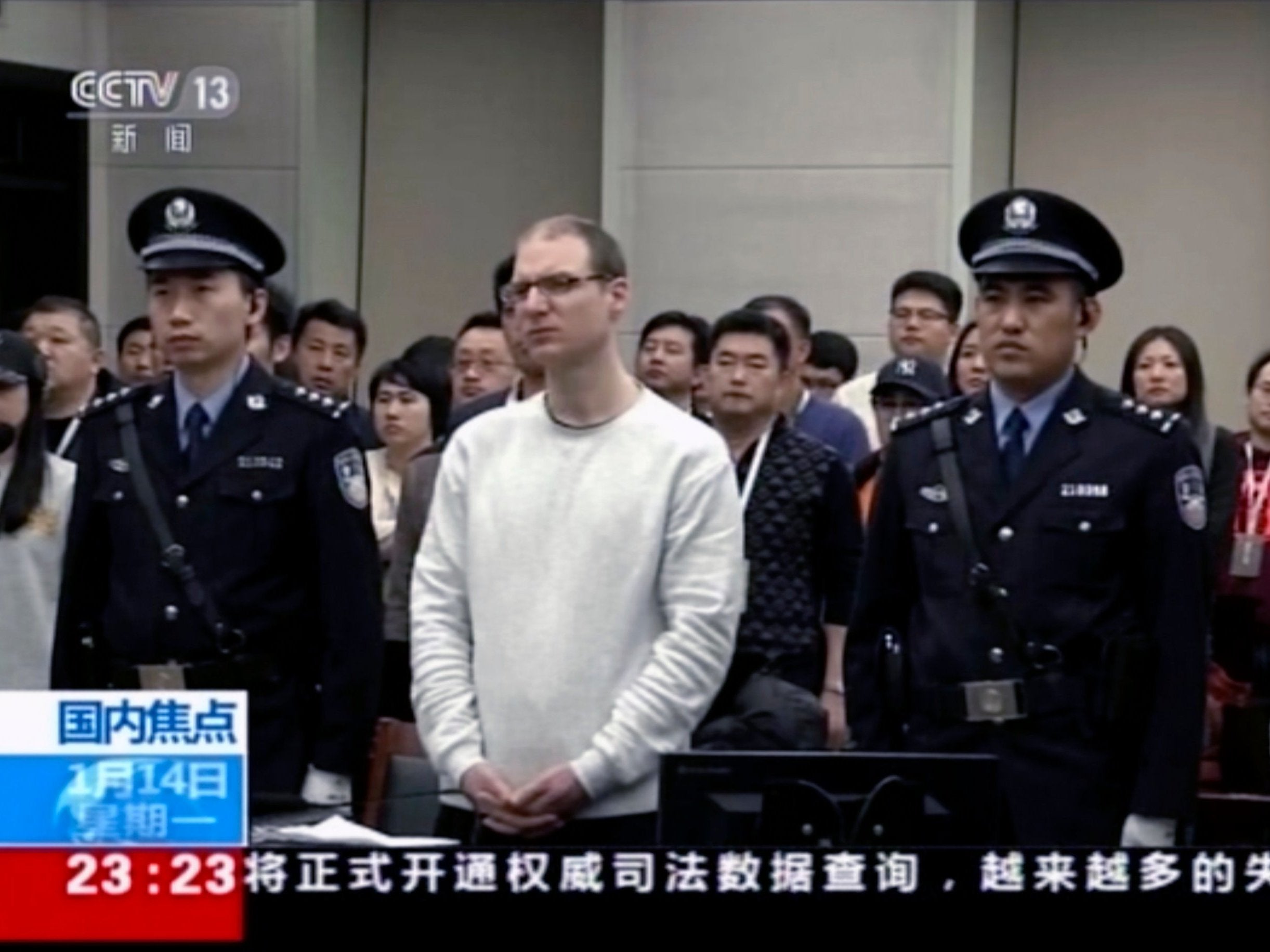 Robert Lloyd Schellenberg attends his retrial in northeastern China's Liaoning province