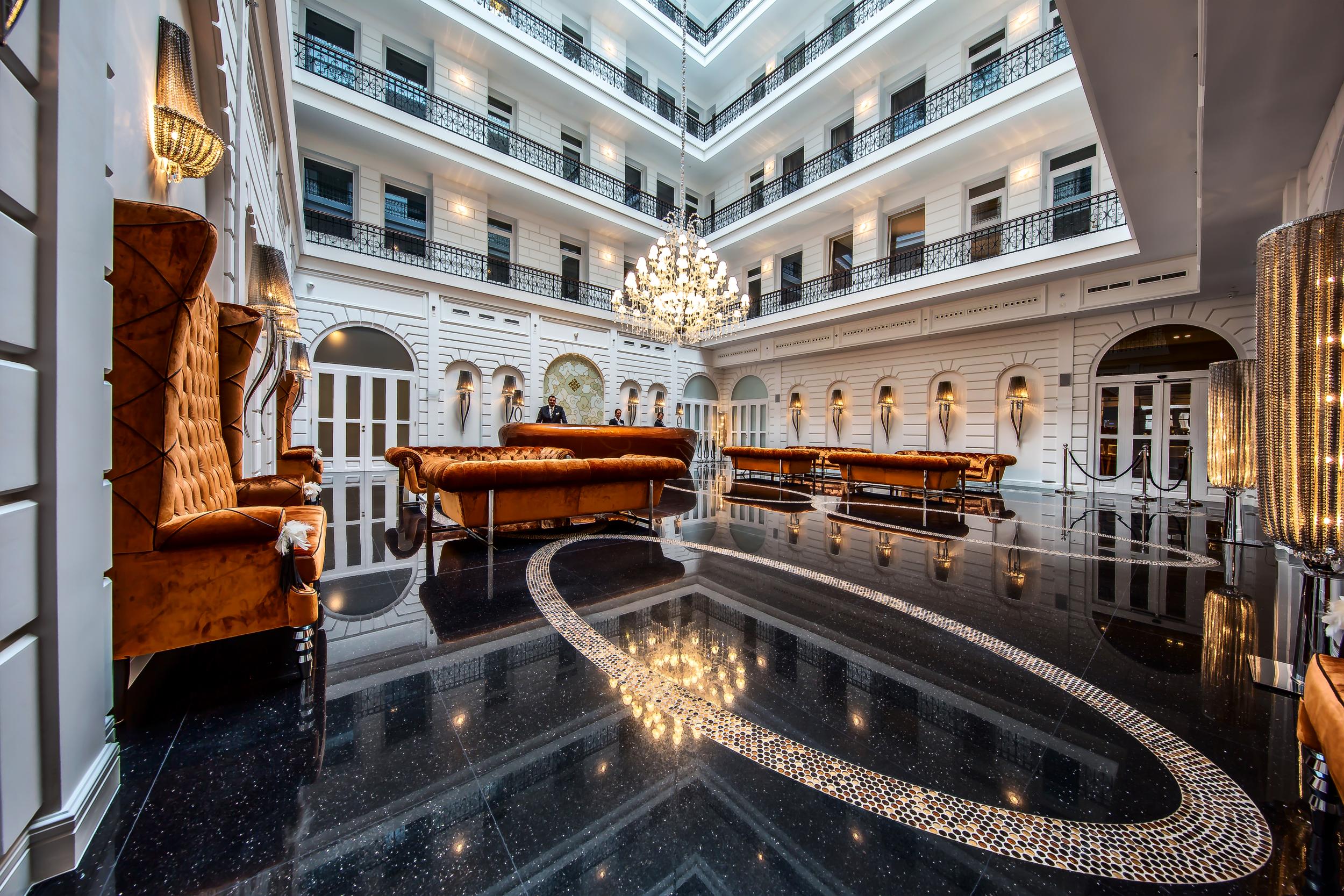 The imposing lobby at the Prestige Hotel