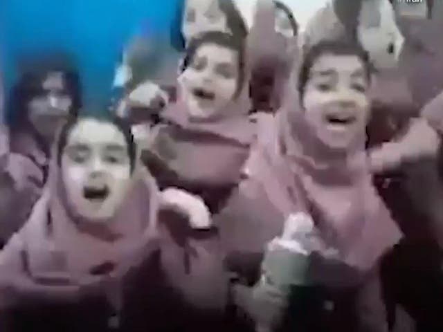 Schoolgirls dance and sing along to the Sasy Mankan song 'Gentleman'