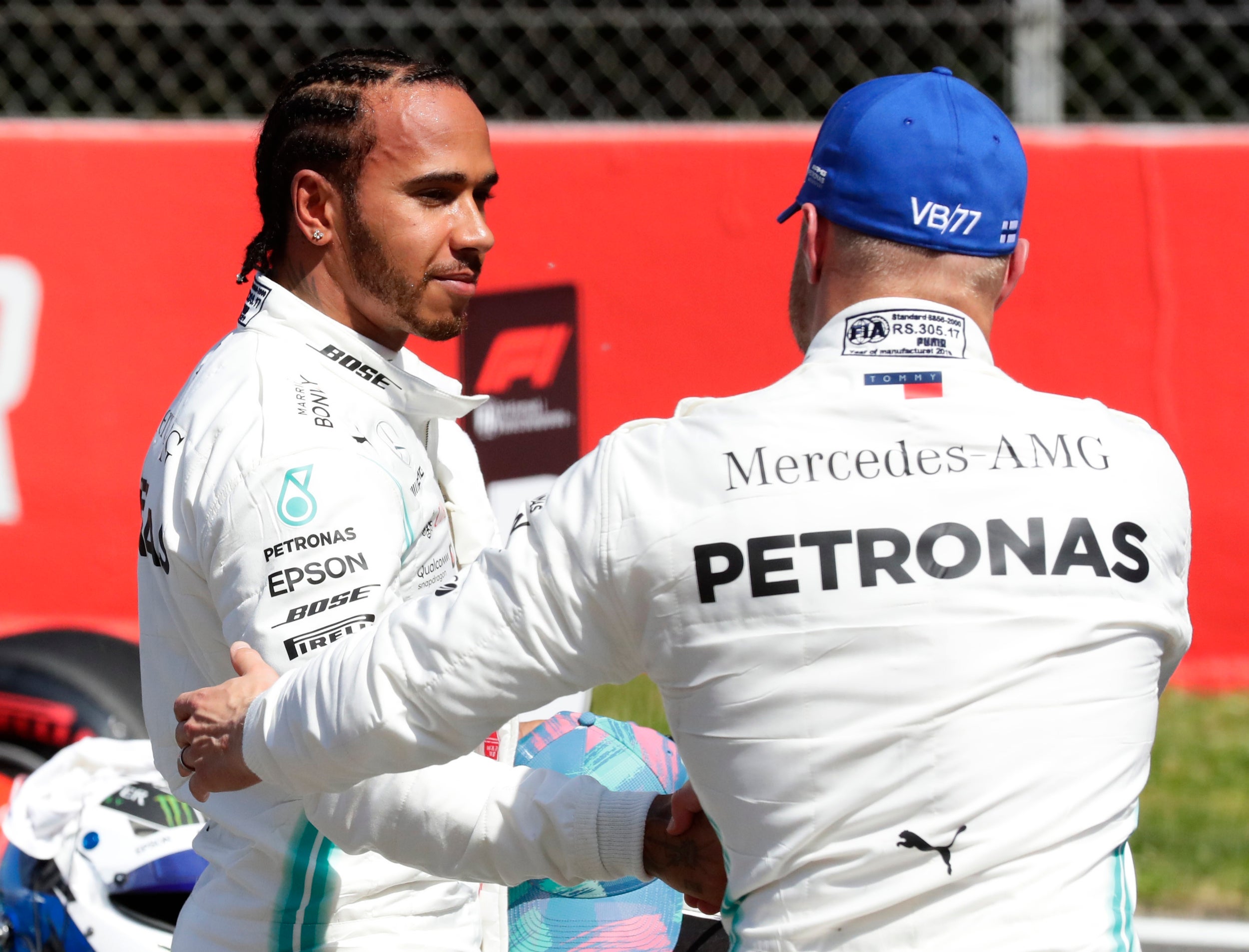 Lewis Hamilton congratulates Valtteri Bottas on his pole position