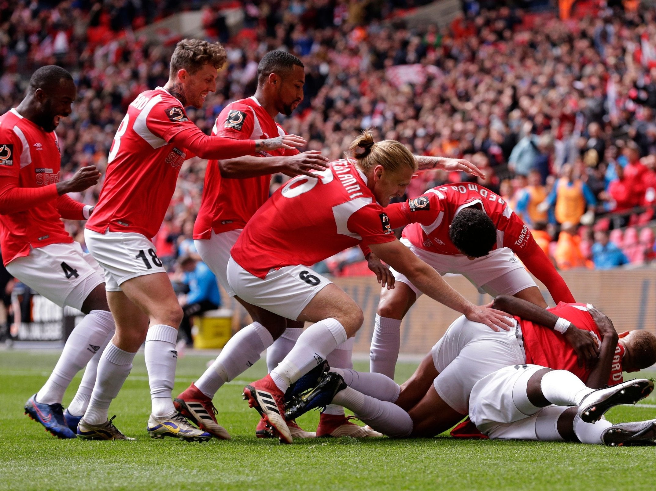 Salford City celebrate Mani Dieseruvwe's opening goal