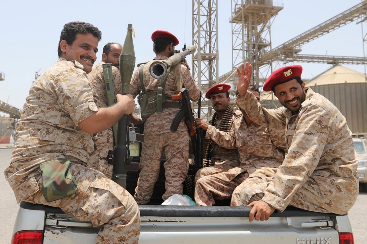 Withdrawal of rebels from Yemen port, believed to signal end to fighting, disputed by government
