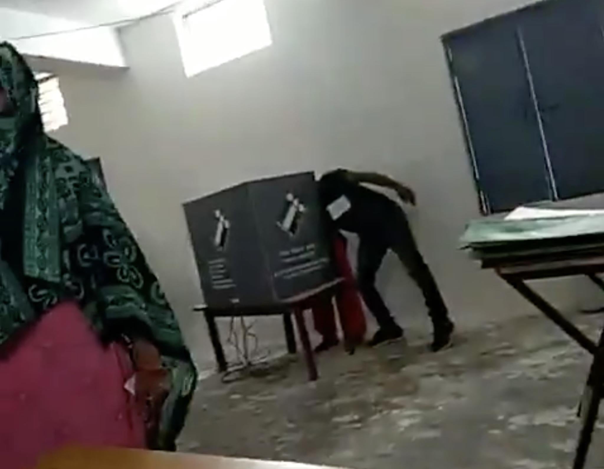 Video purports to show a polling agent interfering as women go to vote in Faridabad, Haryana