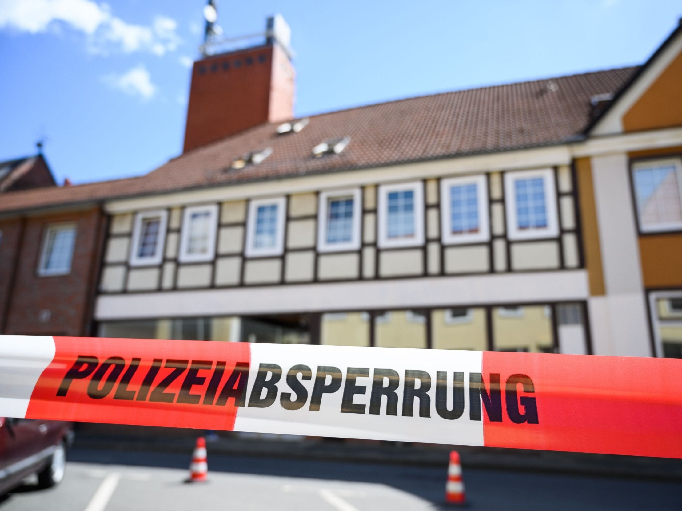 A house in Wittingen, northern Germany, is cordoned off by police after the discovery of two more bodies