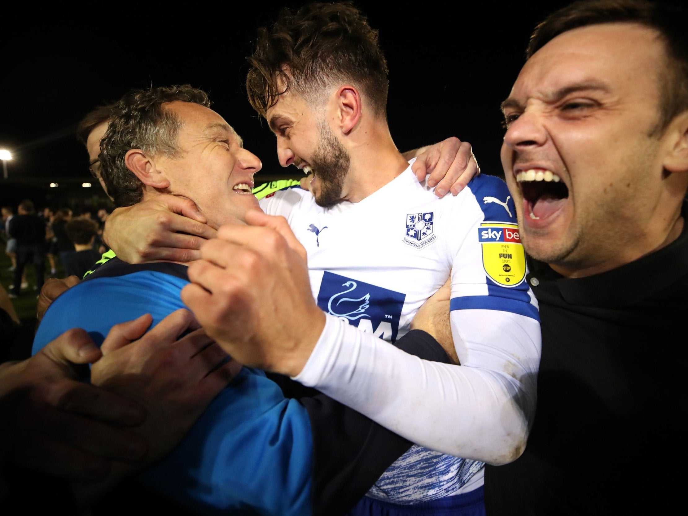 Tramere Rovers manager Micky Mellon and Ollie Banks celebrate victory after beating Forest Green Rovers