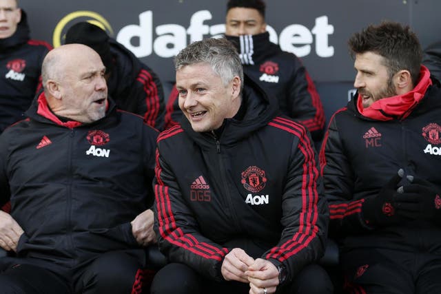 Manchester United's manager Ole Gunnar Solskjaer, Mike Phelan and Michael Carrick